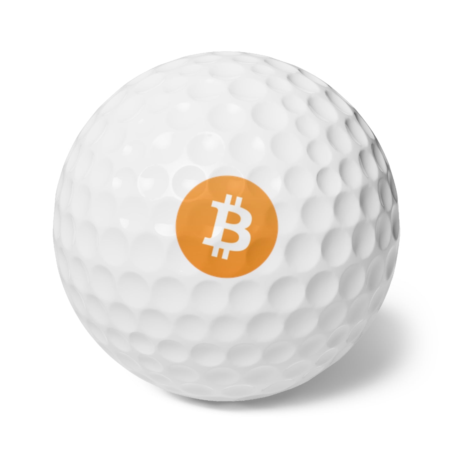 White golf ball with orange Bitcoin ₿ logo.