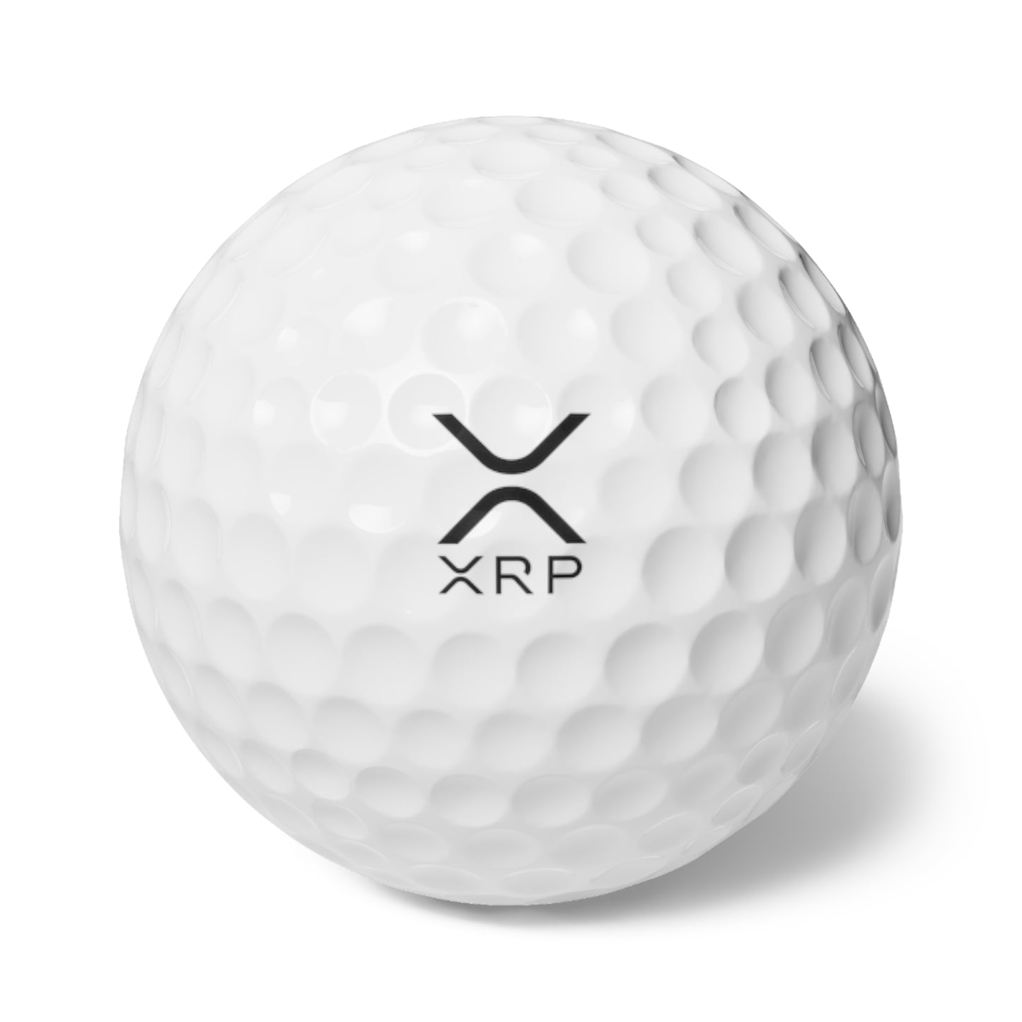 White golf ball featuring the bold XRP logo, designed by HODL Haus, blending premium sports performance with cryptocurrency-inspired style.