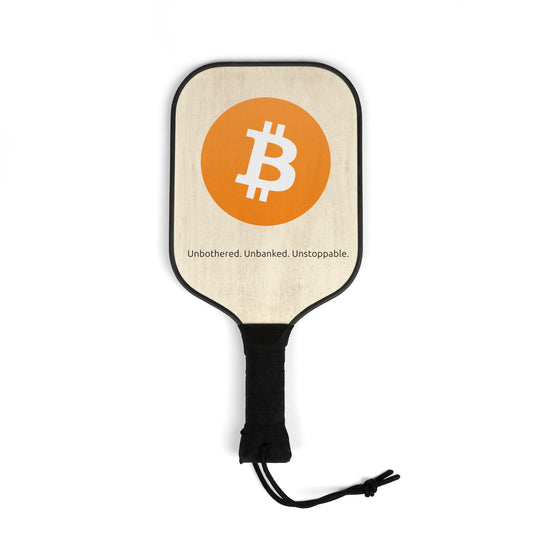 Bitcoin pickleball paddle set with ₿ symbol and “Unbothered. Unbanked. Unstoppable.” slogan, includes carry bag and balls.