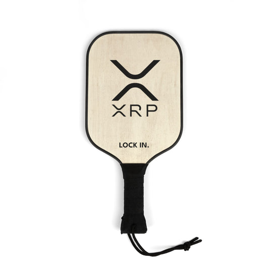 XRP pickleball paddle with bold XRP logo and “LOCK IN” text, wood construction, black poly-cotton handle, and bright graphics, includes carry bag.