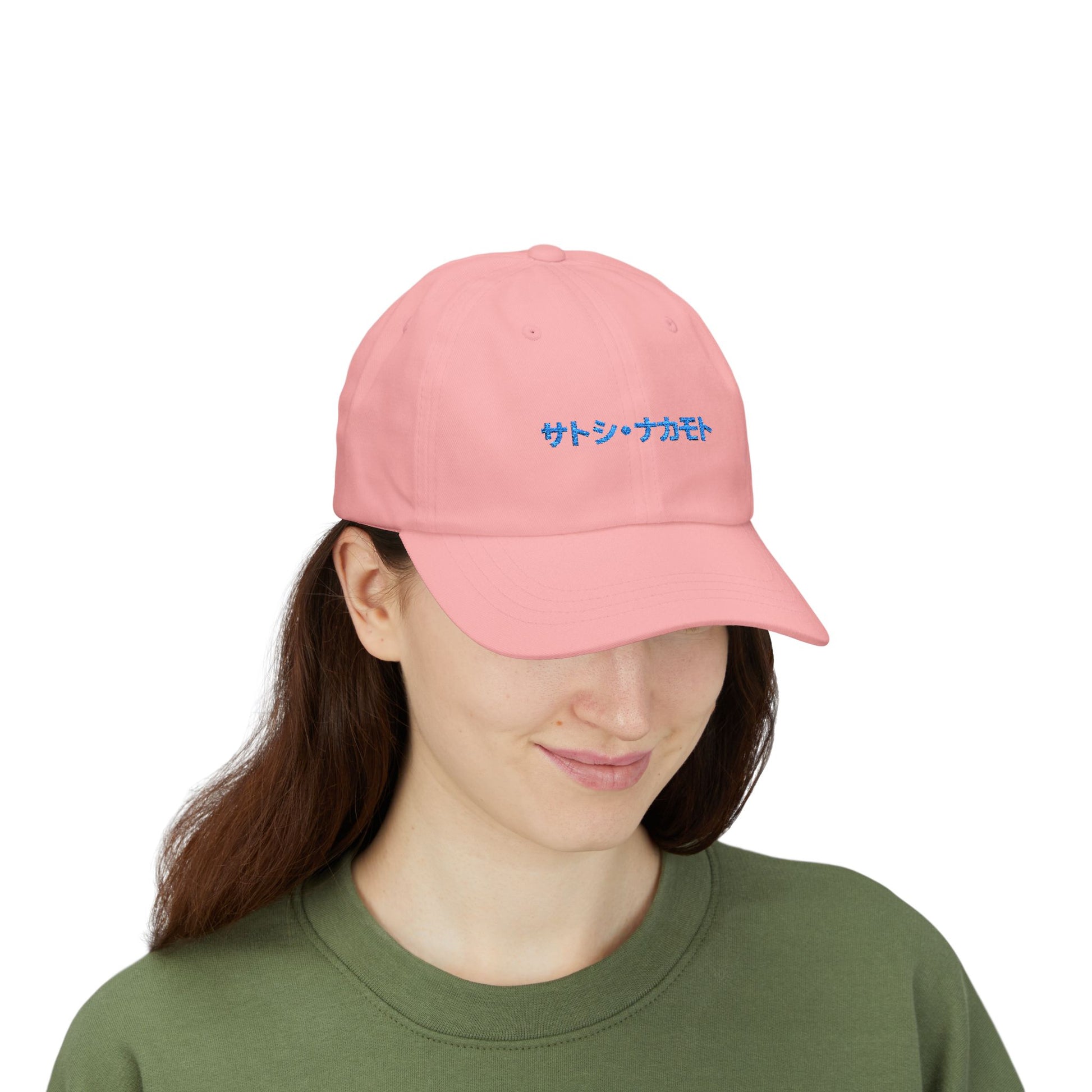 Pink with embroidered “サトシ・ナカモト” (Satoshi Nakamoto) in royal blue Japanese Katakana.